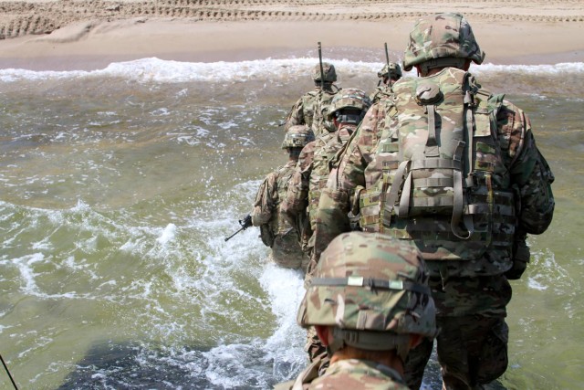 Army paratroopers take beach during exercise