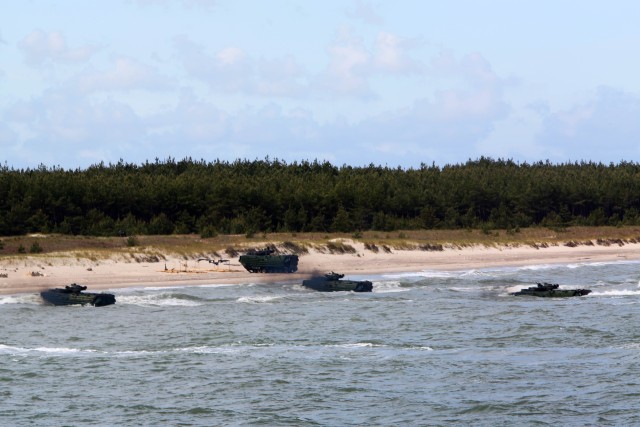 Army paratroopers take beach during exercise