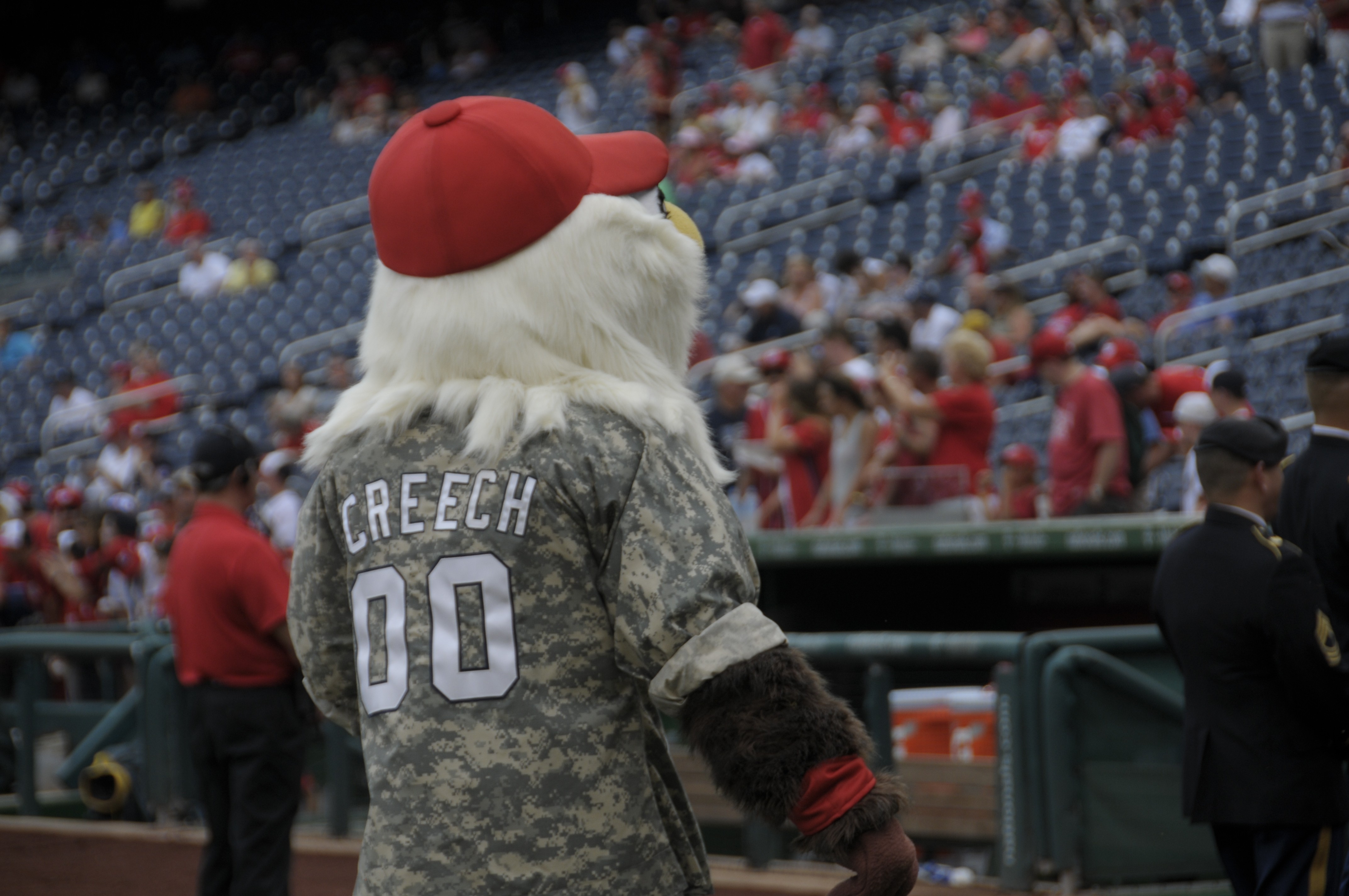 Screech, the Washington Nationals' mascot, offers Chief Navy