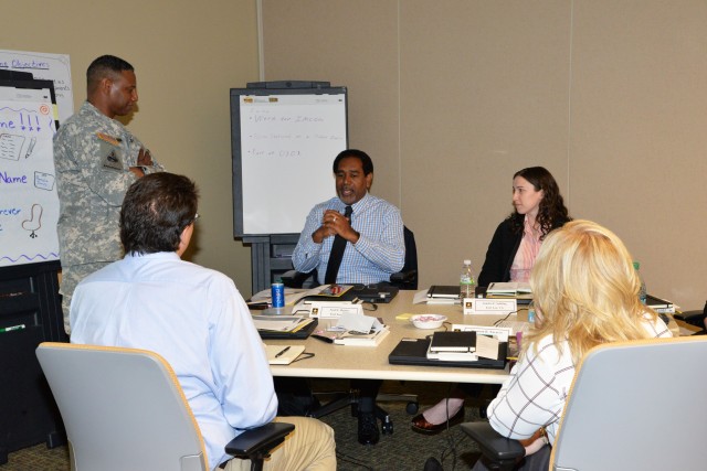 MG Lawarren Patterson listens to coaches and interns at CP29 Class