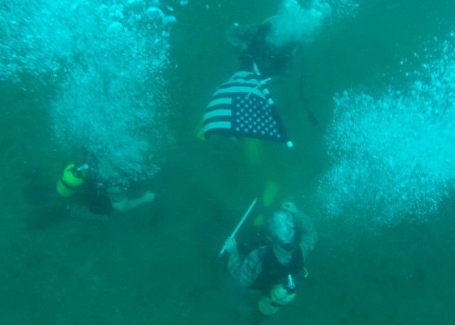 Making a splash: NCO goes deep to re-enlist