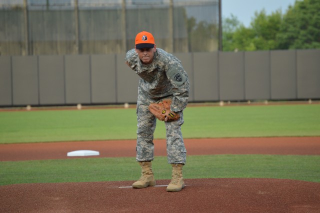 ATEC comander throws first pitch opening night