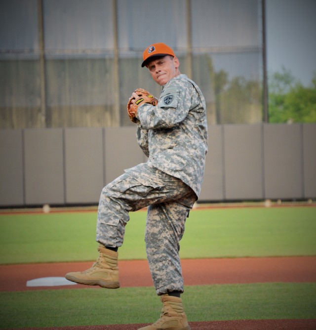 ATEC comander throws first pitch opening night