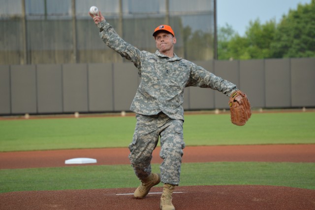 ATEC comander throws first pitch opening night