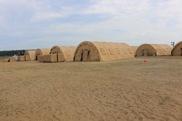 Setting up troop sleeping quarters.