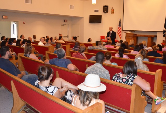AMEDD Civilian Corps Chief Stevens addresses civilian concerns at Ft. Irwin town hall.