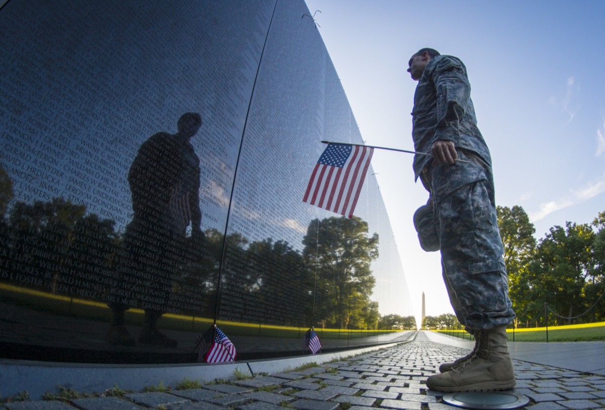 Soldier reflects and Vietnam Memorial wall | Article | The United