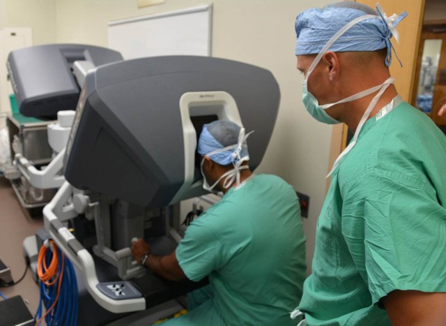 Surgeons use surgical robot to perform procedure