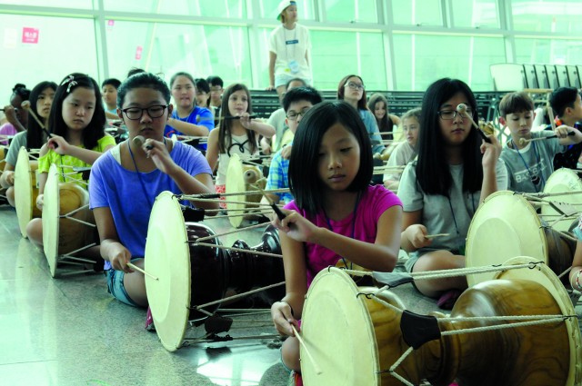 American and Korean children become friends at the Korean-American Joint Summer School