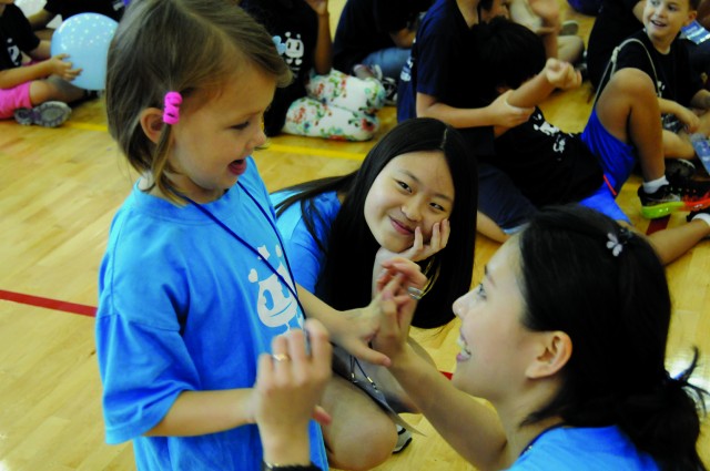 American and Korean children become friends at the Korean-American Joint Summer School