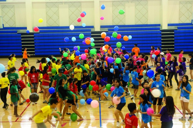 American and Korean children become friends at the Korean-American Joint Summer School