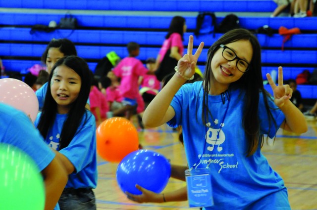 American and Korean children become friends at the Korean-American Joint Summer School