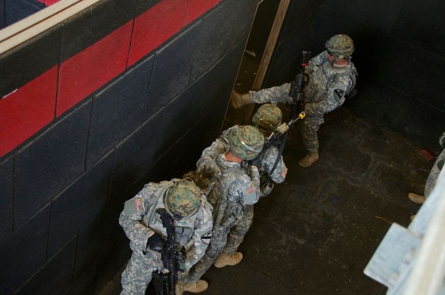 Cavalry unit masters shoot house skills while away from home