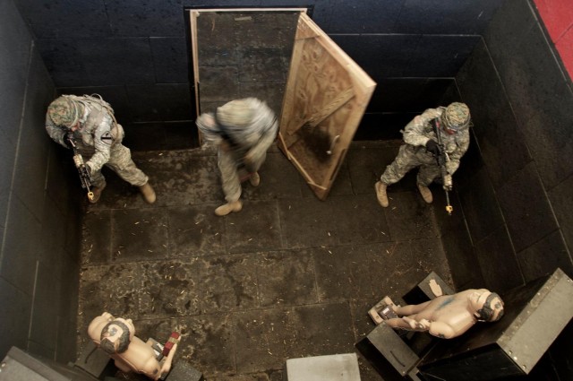 Cavalry unit masters shoot house skills while away from home