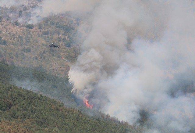 U.S. and Swiss aviators fight fires in Kosovo