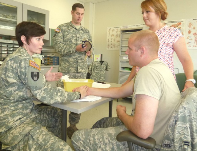 A1C Spencer Stone Receives Occupational Therapy at LRMC