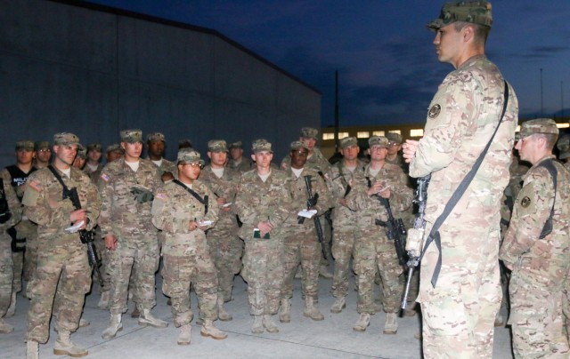Soldiers work together for a united front during exercise
