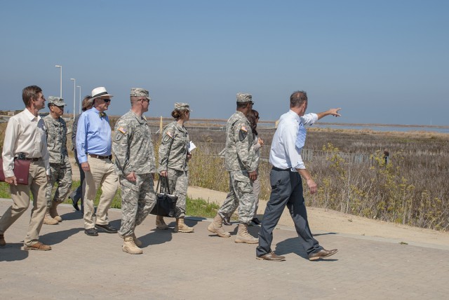 Engineers present plan to reduce threat of flooding along bay
