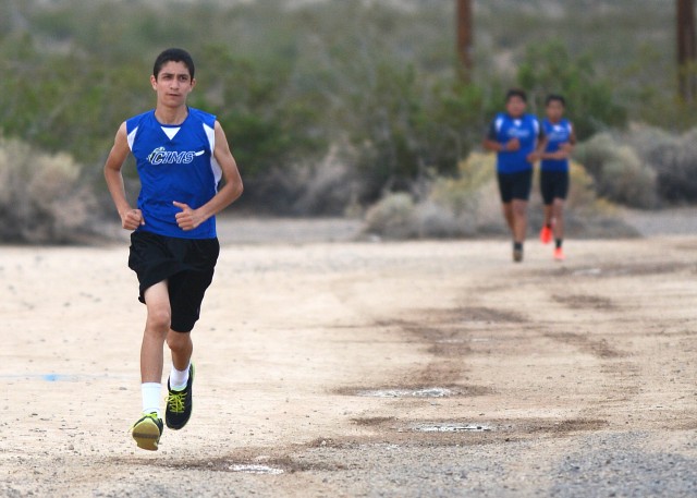Runners from CIMS head towards finish line