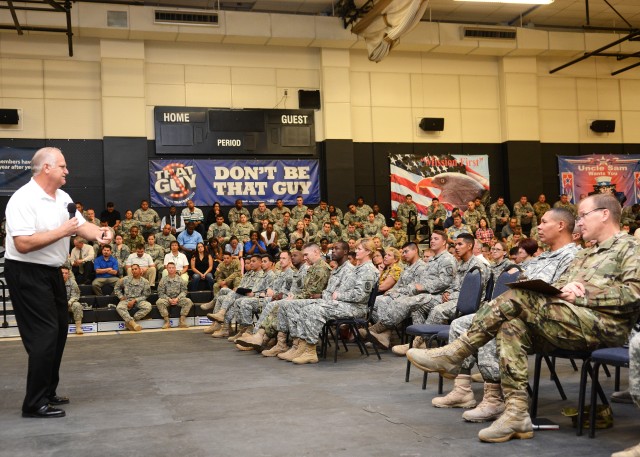 Eric Hipple speaks to an audience of Fort Irwin leadership, Soldiers and community members, Sept. 2