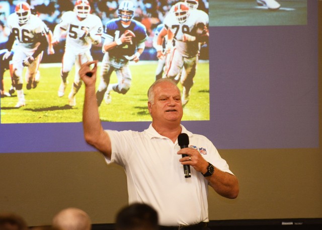 Eric Hipple, former NFL quarterback, speaks to the Fort Irwin community
