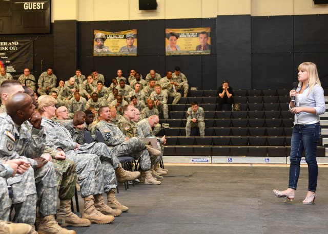 Tarah Hipple speaks to Fort Irwin Soldiers