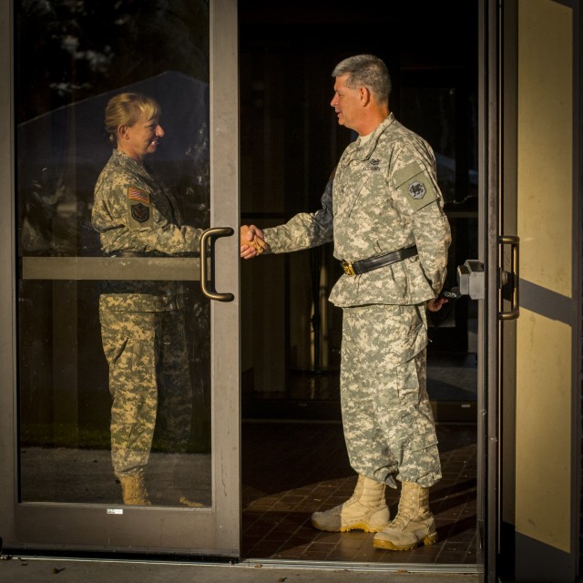 Major generals handshake before change of command