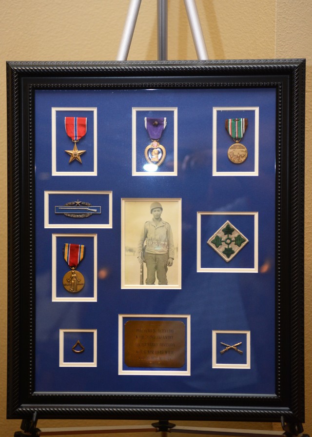 Medals and photo of U.S. Army Pfc. Tino Acevedo
