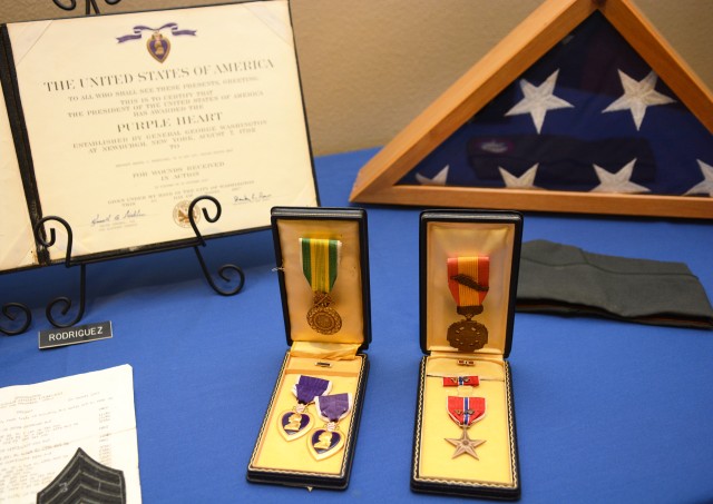 Purple Heart medal and flag of U.S. Army Sgt. Manuel Rodriguez