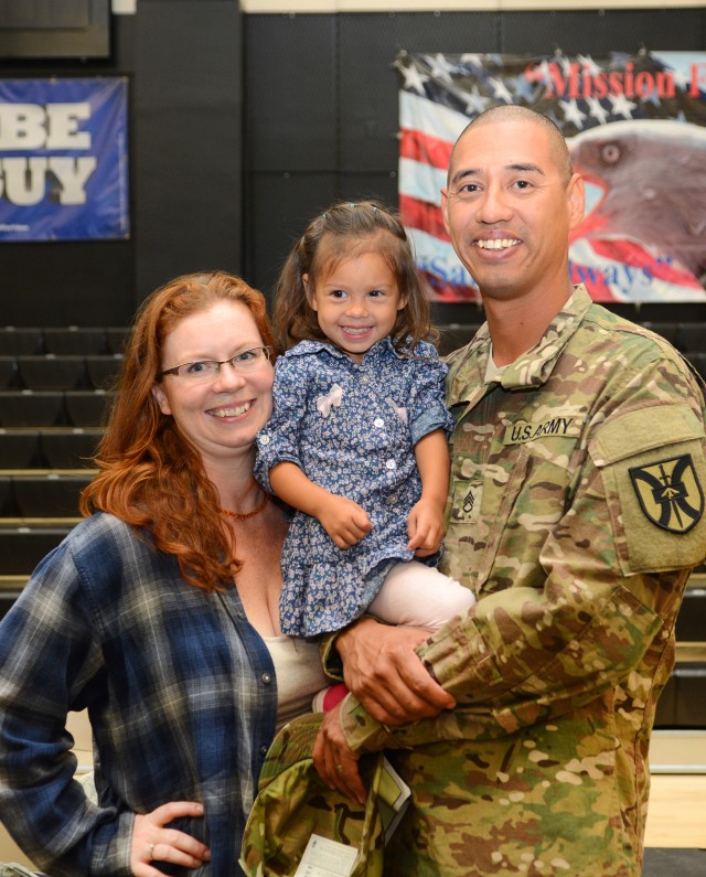 Staff Sgt. James Smith Jr., and family