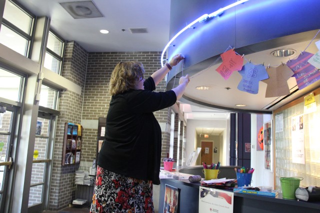Paper-shirt display promotes domestic-violence awareness