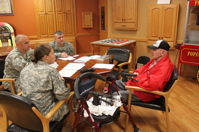 Engineer Regiment cadre meet WWII survivor, topographical drafter