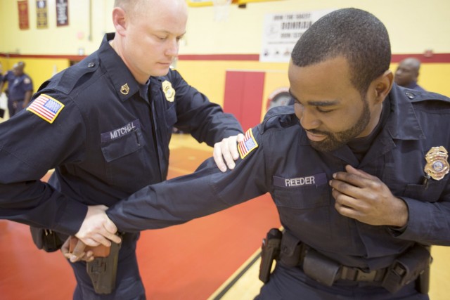 Joint base law enforcement undergo tough training to maintain readiness
