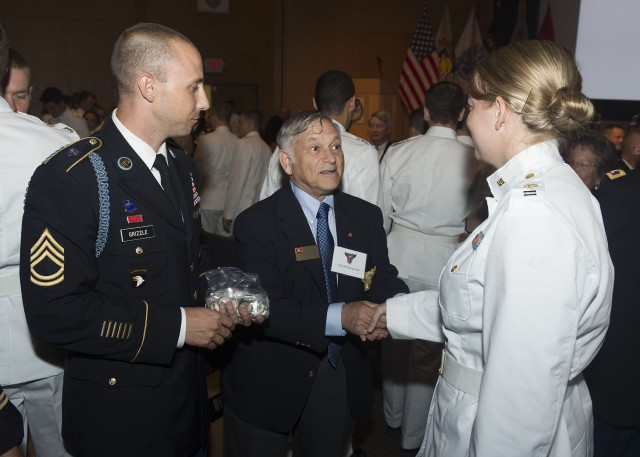 TAC NCO hands out coins