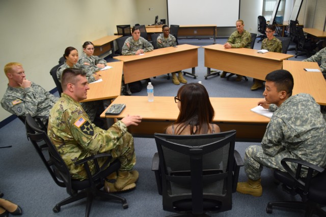 Soldiers participate in discussion with nK defector at Osan AB