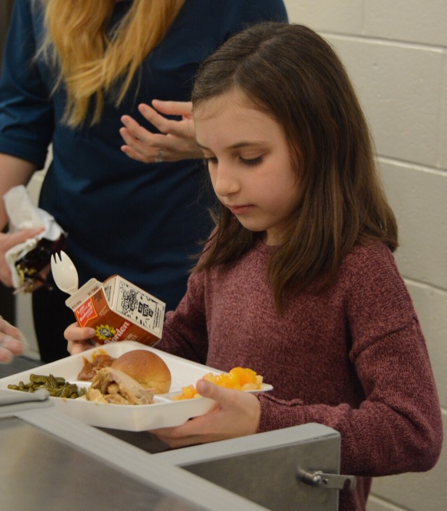 Students get Thanksgiving lunch at C. C. Pinckney Elementary School