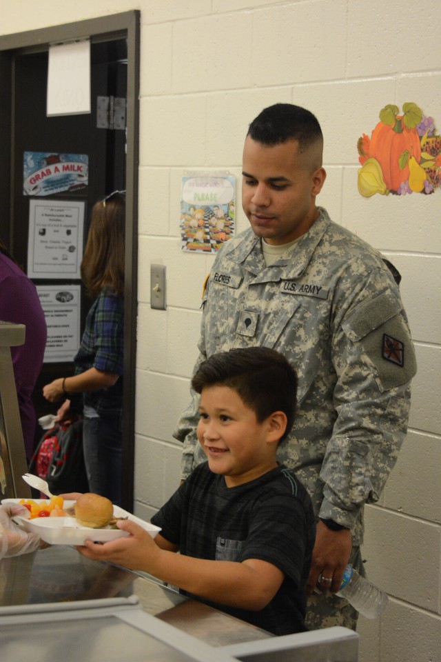 Children get Thanksgiving lunch at C. C. Pinckney Elementary School