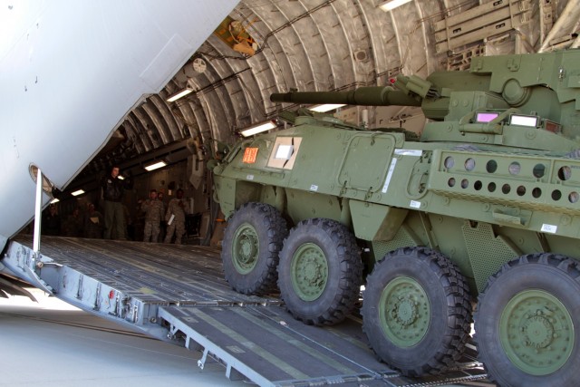 Soldiers, Airmen partner for Mobile Gun System Stryker air mobility