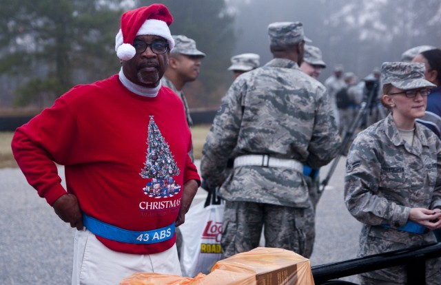 Service members, families motivated by holiday spirit for Operation Toy Trot