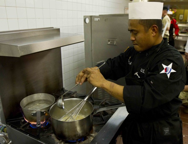Chef stirs the pot