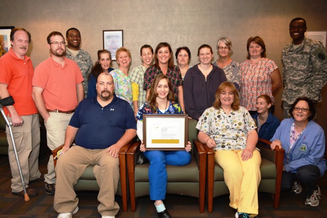 Guthrie Ambulatory Health Care Clinic Laboratory team members proudly display the College of American Pathologists Accreditation Certificate