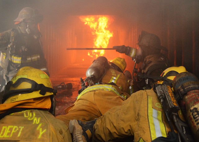 Fire explorers inside training burn trailer