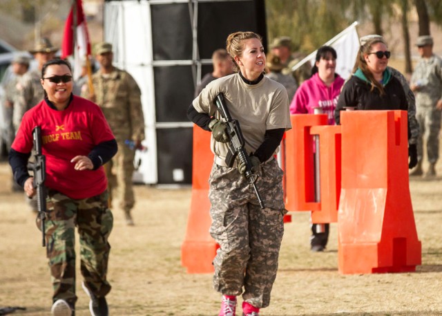 Military spouses carry M4 carbines