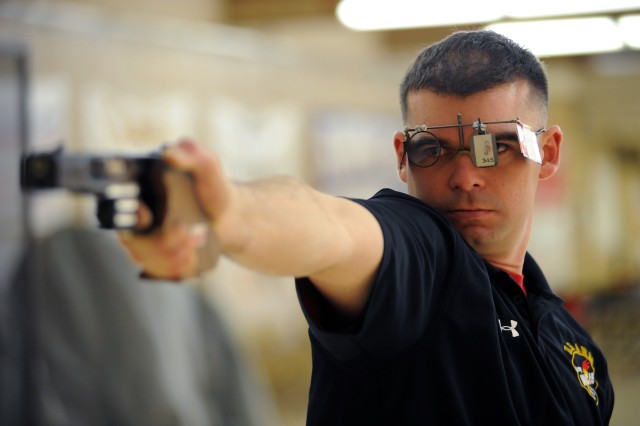 Sgt. 1st Class Keith Sanderson takes aim