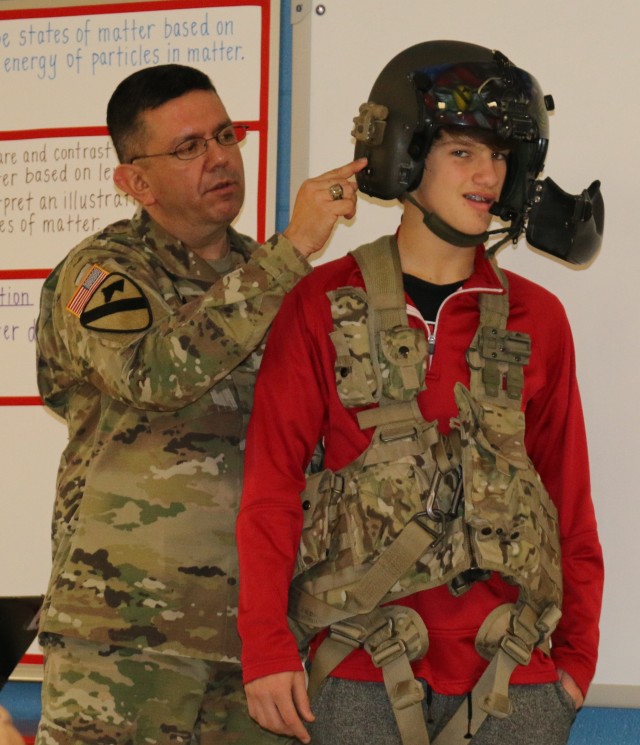 TRYING ON HELMET FOR SIZE