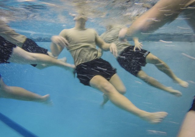 ROTC cadets treading water