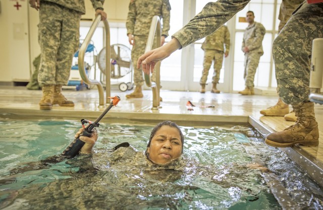 Female cadet finishes 15-meter swim