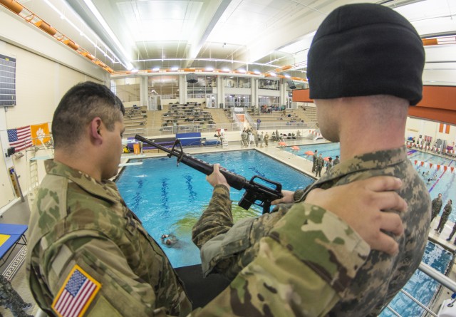 Combat Water Survival Test briefing on the high dive
