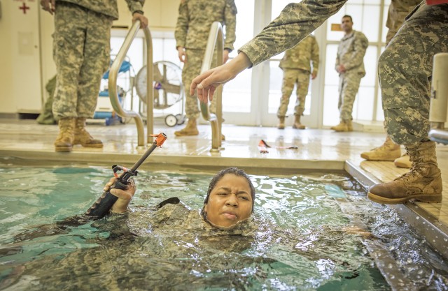 Female cadet completes 15-meter swim