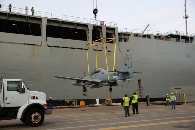 A-29 Super Tucano being loaded onto the USNS MV Cape Rise
